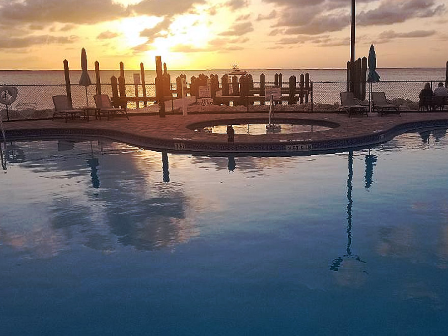 Keys Palms RV Resort pool at sunset.